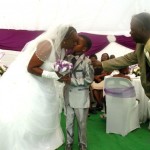 Proof rumours that Sanele required a step-ladder to kiss the bride are utterly untrue
