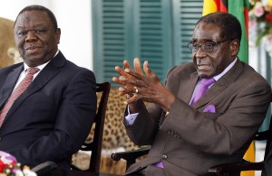 Zimbabwean President Robert Mugabe and Prime Minister Morgan Tsvangirai address a media conference at State House in the capital Harare