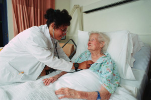 Elderly Woman in Hospital Bed