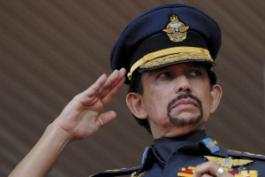 Brunei?s Sultan Hassanal Bolkiah salutes to guard-of-honour during National Day celebrations in Bandar Seri Begawan