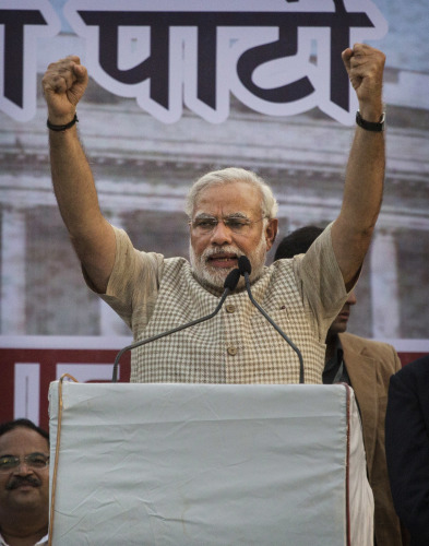 Narendra Modi thanks supporters who turn out in force following his landslide victory 