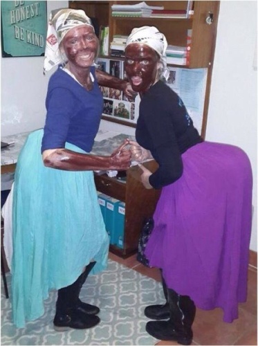 University of Pretoria students give their black maid fancy dress the thumbs up 