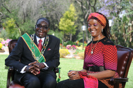 Robert Mugabe with his young wife; perhaps the reason he’ll have the good Grace to stand down