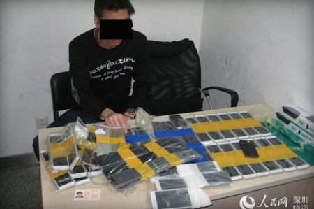 The phones were sealed in clear bags and taped all over the man’s body