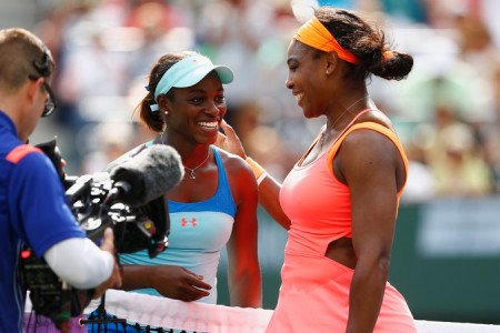 A smiling Sloane Stephens (left) congratulates Serena Williams after their fourth round battle