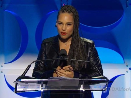 Alicia Keys addresses an expectant audience during the launch of the Tidal music subscription service