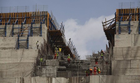 Ethiopian workers on the Grand Renaissance Dam near the Sudanese-Ethiopian border. The $4.8 billion (€4.5bn) project will provide not just Ethiopia with power but also allow the exporting of energy to neighbouring countries. Photograph: Zacharias Abubeker/AFP/Getty Images