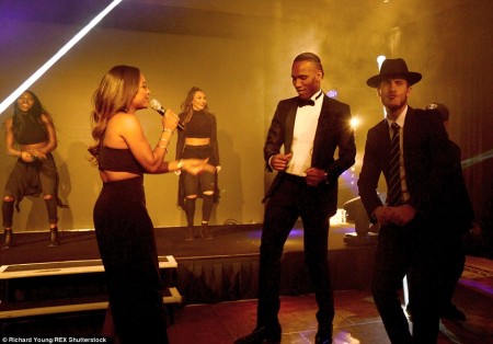 Didier Drogba (centre) and Chelsea hero of the hour Eden Hazard (right) bust some moves to the dulcet tones of Christina Milian (left)