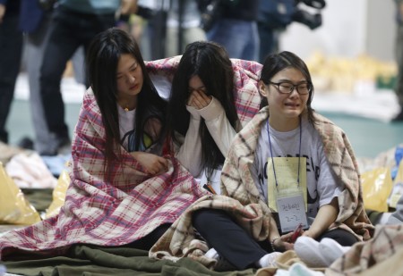 Korean ferry survivors say they were told to stay put while the vessel sank