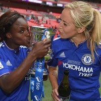 Eni Aluko (left) shares the moment with outstanding strike partner Gemma Davidson as both kiss the Women’s FA Cup
