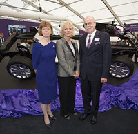Innovate UK chief executive Dr Ruth McKernan, Business Minister Anna Soubry and Jaguar Land Rover director of research and technology Dr Wolfgang Epple at the unveiling of the chassis of a Concept_e vehicle