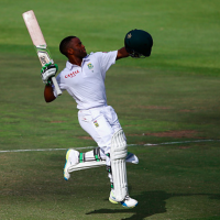Temba Bavuma celebrates the first hundred scored by a Black batsman for South Africa